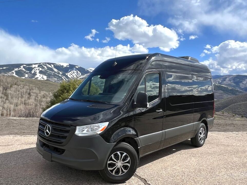 Mercedes Sprinter 12 Passenger Van Rental in Colorado with Winter Snow Tires 